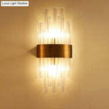 Postmodern Gold Wall Sconce With Fluted Crystal Shade - 2 Head Bedroom Mount Light