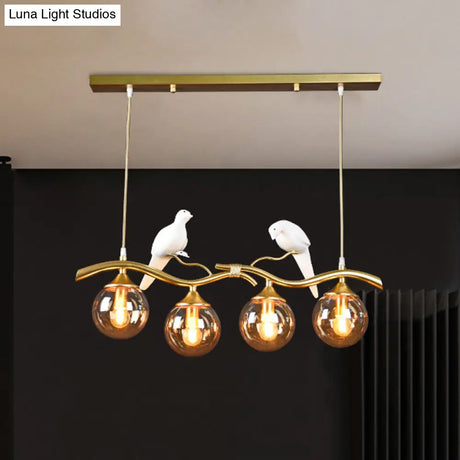 Postmodern Iron Pendant Light With 4-Lights Black/Gold Finish Amber Ball Glass Shade Bird Deco -