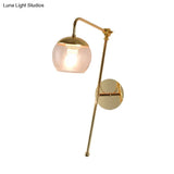 Postmodern Swing Arm Wall Sconce Light With Clear Glass Shade In Black/Gold