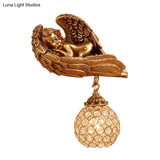 Resin 1-Head Dark Gold Wall Mounted Lamp With Globe Faceted Crystal Shade - Sleeping Angel Hallway