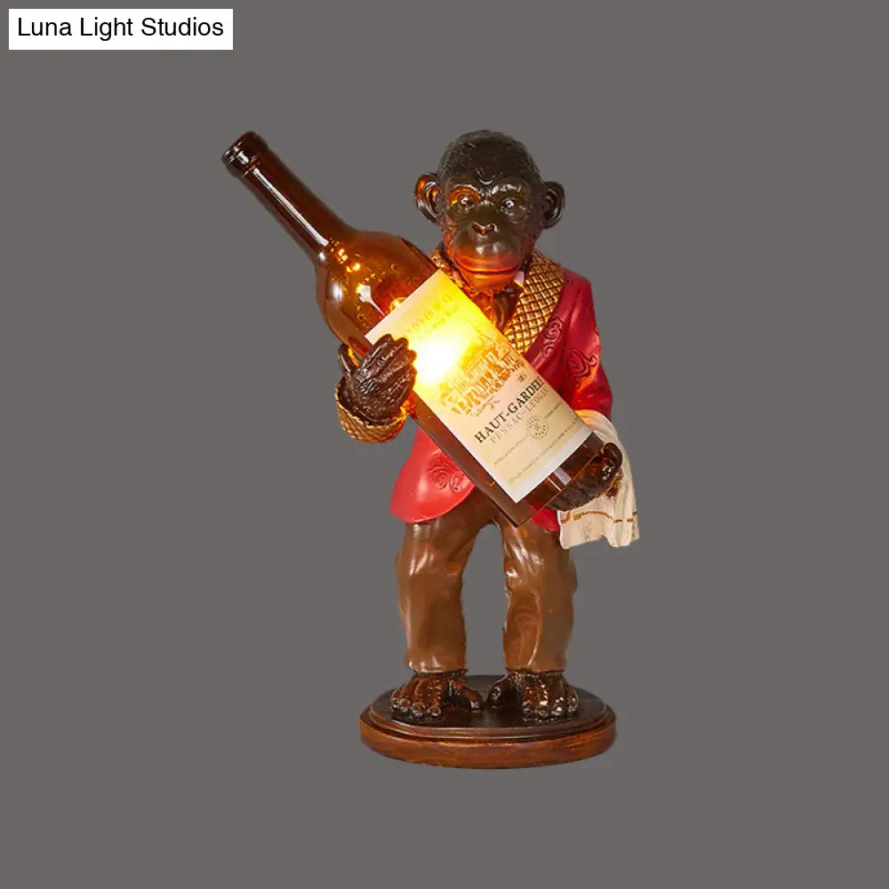 Retro Gorilla Wine Holder 1-Light Desk Lamp In Amber Glass For Night Table Red/Gold