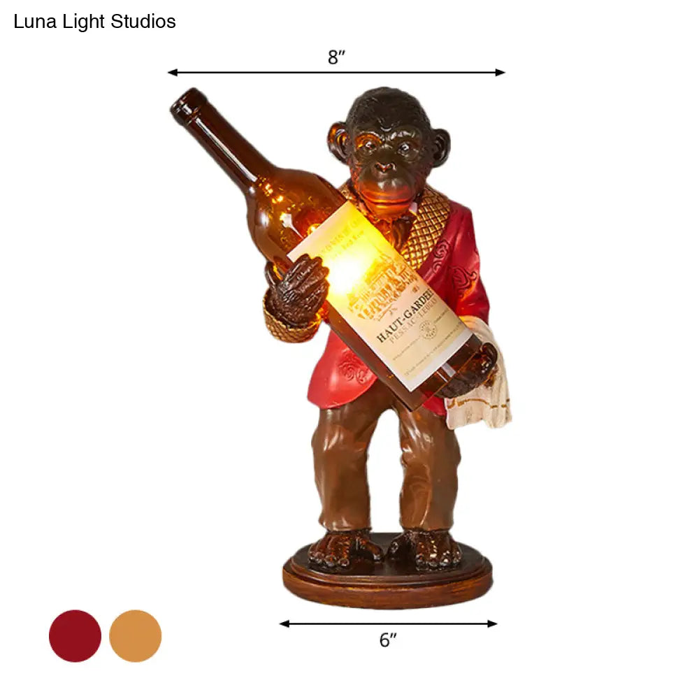 Retro Gorilla Wine Holder 1-Light Desk Lamp In Amber Glass For Night Table Red/Gold