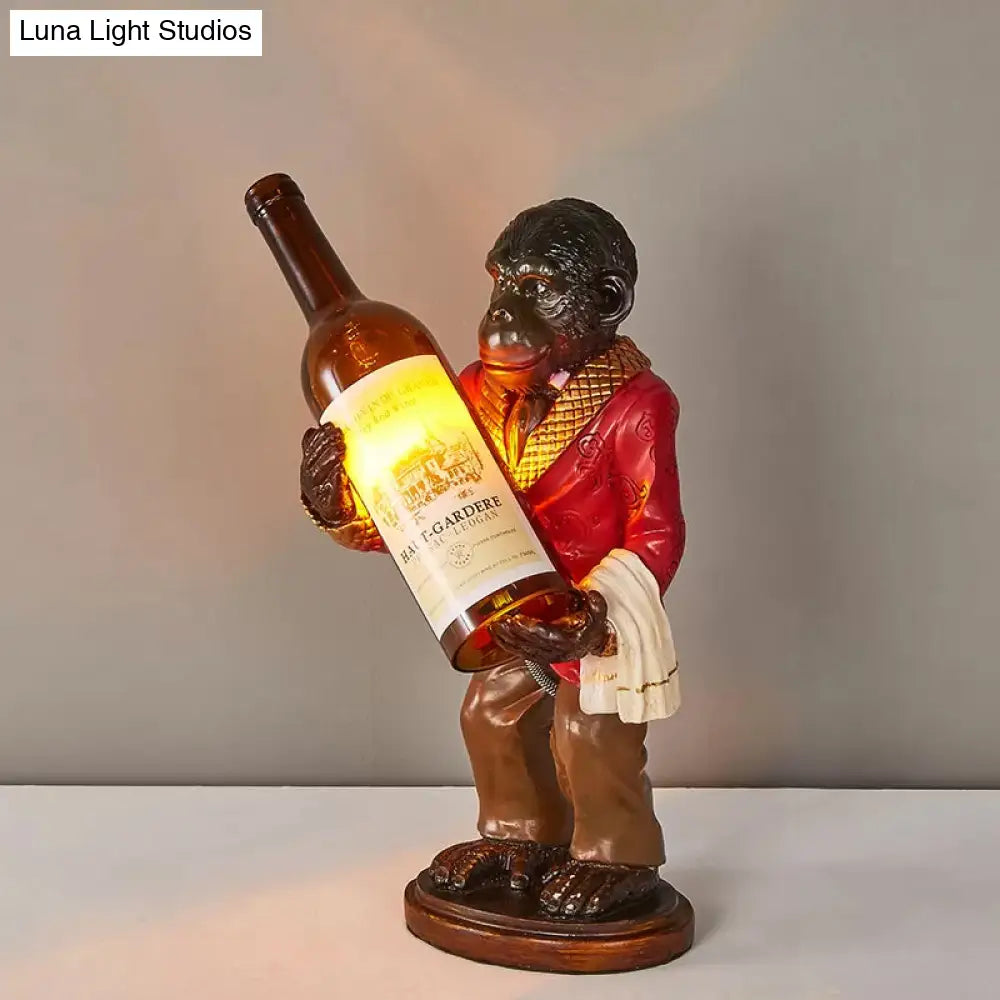 Retro Gorilla Wine Holder 1-Light Desk Lamp In Amber Glass For Night Table Red/Gold