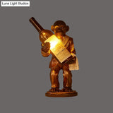 Retro Gorilla Wine Holder 1-Light Desk Lamp In Amber Glass For Night Table Red/Gold