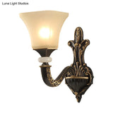 Retro Wall Mounted Light Fixture With Black 1/2-Bulb Milky Glass Flared Shade
