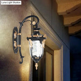 Rural Single Light Clear Glass Wall Sconce - Outdoor Urn Fixture In Black And Gold