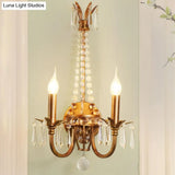 Rustic Antiqued Gold Iron Wall Mount Lighting With Crystal Accent - 2-Head Candlestick Lamp