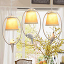 Rustic Beige Pendant Light With Bird Accent - Stylish Oval Metal Ceiling For Hotels

This Improved