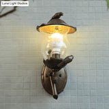Rustic Black Gourd Shaped Garden Wall Lamp - 1-Light Seedy Glass Lantern Sconce With Charming Bird