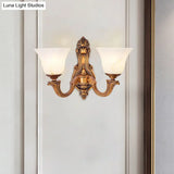 Rustic Brass Bedroom Wall Sconce With Frosted Glass Shade - 2 Light Bell Lamp