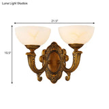 Rustic Brass Wall Sconce With Frosted Glass Shade - Swooping Arm Design For Ambient Lighting