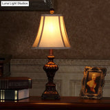 Rustic Brown Resin Nightstand Lamp With Urn Shaped Base Fabric Shade And 1-Bulb