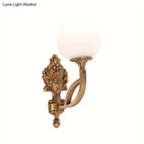 Rustic Flower Wall Mounted Lamp: 1-Light Cream Glass Sconce In Brass With Carved Backplate