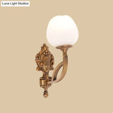 Rustic Flower Wall Mounted Lamp: 1-Light Cream Glass Sconce In Brass With Carved Backplate