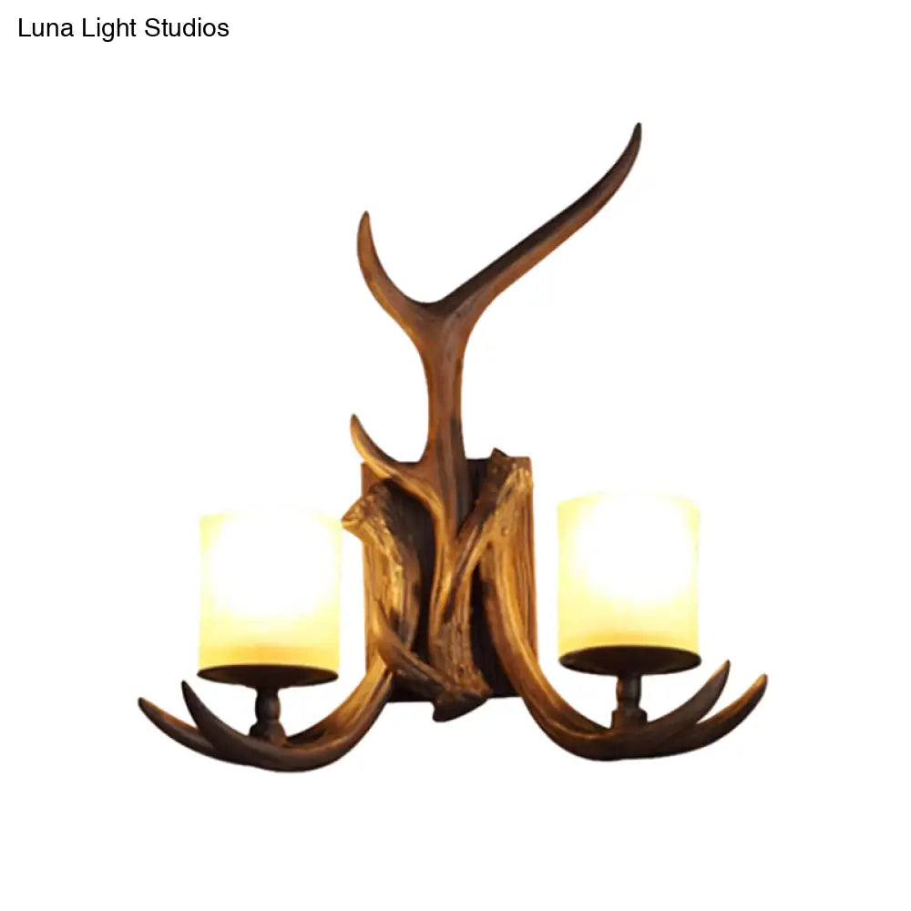 Rustic Frost Glass Wall Lamp With Brown Cylinder 2 Bulbs - Decorative Antler Accent For Living Room