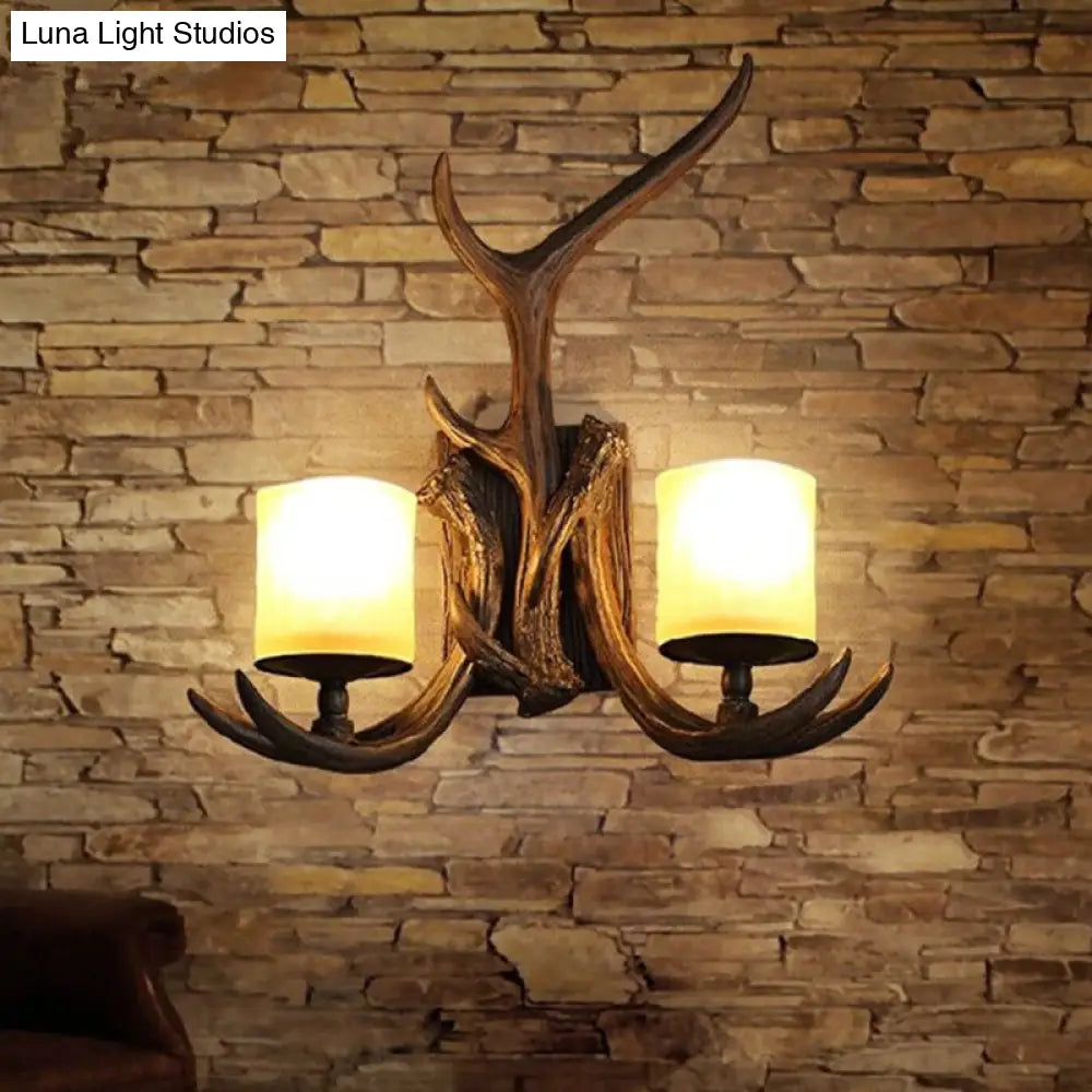 Rustic Frost Glass Wall Lamp With Brown Cylinder 2 Bulbs - Decorative Antler Accent For Living Room
