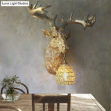 Rustic Gold Resin Deer Sconce Lamp - Wall Mounted Light With Crystal Glass Shade