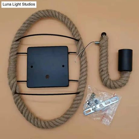 Rustic Indoor Wall Light With Wagon Wheel Design And Rope Shade