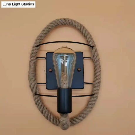 Rustic Indoor Wall Light With Wagon Wheel Design And Rope Shade