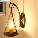 Rustic Lodge Candle Wall Light - Stylish Metallic Sconce For Foyer Illumination