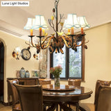Rustic Metal Pendant Chandelier - 6-Light Scalloped Design In White With Fabric Shade And Pinecone
