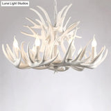 Rustic Resin Antler Chandelier - Artfully Crafted Hanging Light With Exposed Bulb Design