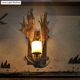 Rustic Resin Antler Wall Mount Light With Handblown Glass Shade - Brown