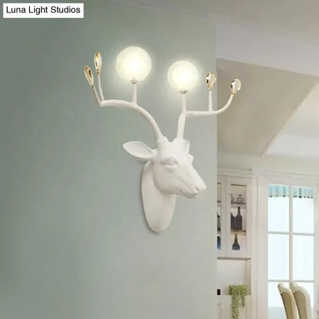 Rustic Resin Sconce Light With Deer Deco - Wall Mounted Lamp For Living Room 2 Lights Black/White