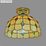 Rustic Tiffany Stained Glass Flush Light With Nature-Inspired Pattern And Antique Brass Finish