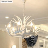 Rustic White Retro Resin Deer Horn Chandelier In Bedroom