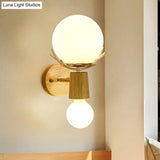 Rustic Wood Wall Lamp With Antler Accents - White Globe Sconce Light For Stairways