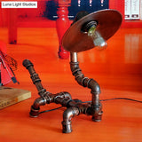 Rustic Wrought Iron Dog Shaped Table Lamp With Industrial Pipe Design - 1 Light Flat Shade Perfect