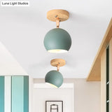 Sleek Adjustable Semi Ceiling Flush Mount With Round Wood Canopy - White/Green Ball Mounted Light