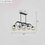Sleek Black Glass Sphere Island Light For Modern Dining Rooms