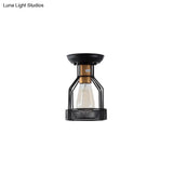 Sleek Black Metal Ceiling Light With Wire Mesh For Industrial Décor - Single Bulb Semi Flush Mount