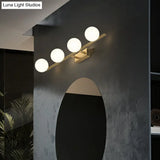 Sleek Gold Linear Vanity Wall Light With Milky Ball Glass Sconce For Bathroom