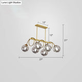 Sleek Gold Spiral Island Light - Post-Modern Metal Ceiling Hang Lamp With Ball Glass Shade