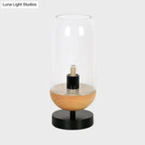 Sleek Led Table Lamp: Modern Black & Wood Cylinder Design With Clear Glass Shade