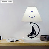 Sleek Mediterranean Metal Bedside Lamp In Black With White Fabric Shade