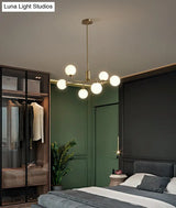 Sleek Modos Chandelier: Simplicity White Glass Ceiling Light With Brass Finish For Living Room
