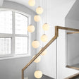 Sleek Silver Staircase Pendant Light With Cream Glass Shades - 10 Head Cluster Design