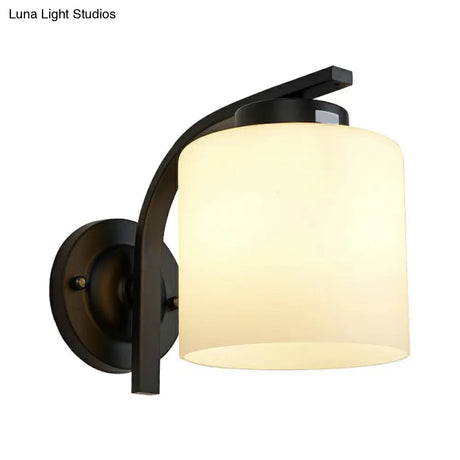 Sleek White Glass Wall Sconce With Black Accents For Living Room