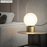 Small Sphere Night Light Glass Table Lamp With Gold Base - Simple And Elegant