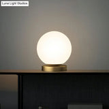Small Sphere Night Light Glass Table Lamp With Gold Base - Simple And Elegant
