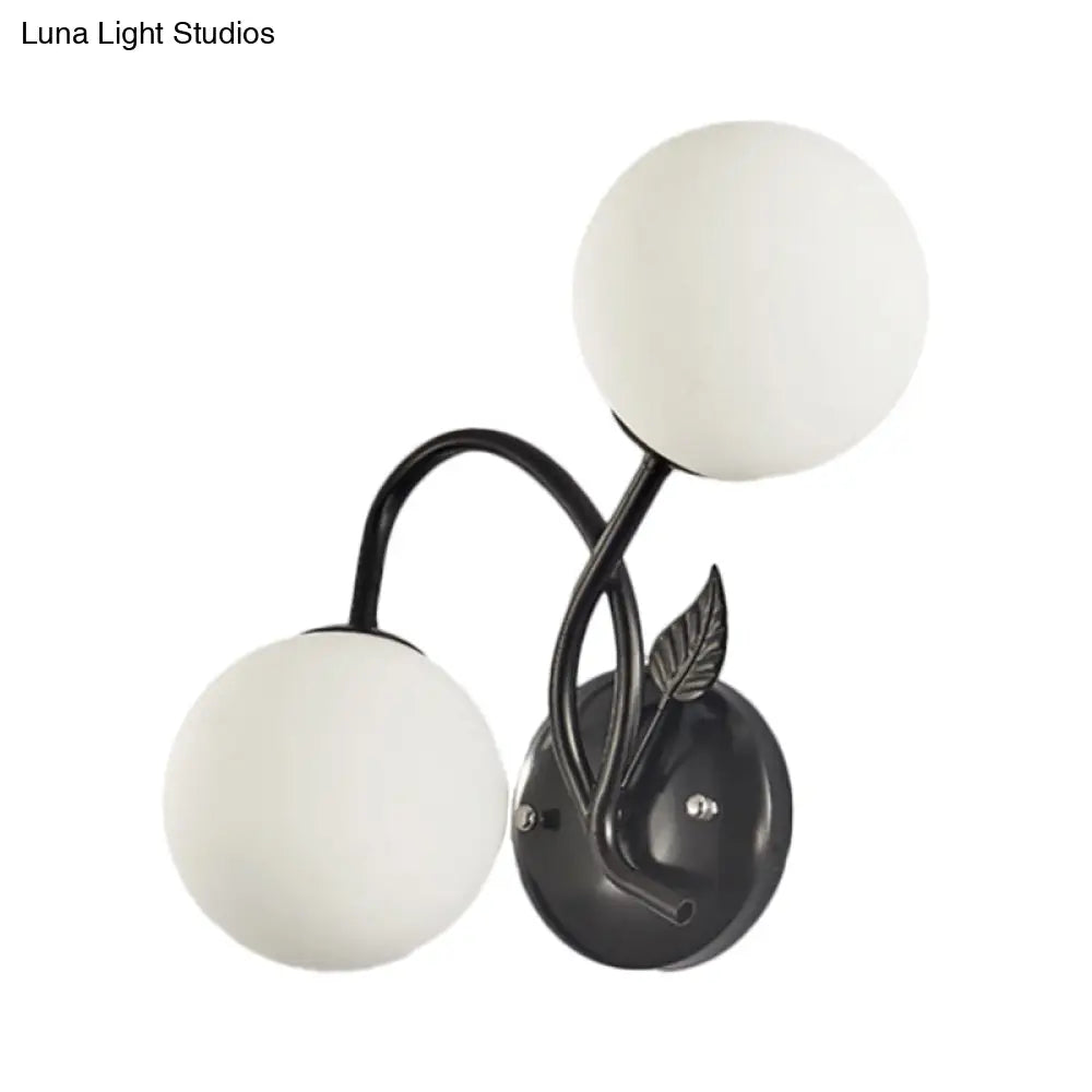 Sphere Sconce Light With Faceted Glass In Black For Modern Spaces