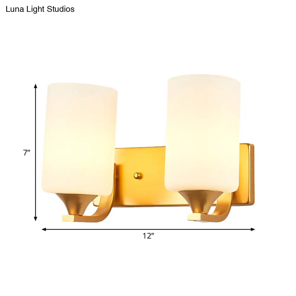 Traditional 2-Bulb Gold Wall Lamp With Milky Glass Cylindrical Fixture