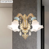 Traditional Blue Frosted Glass Wall Sconce With Ceramic Accent And Ruffle Trim
