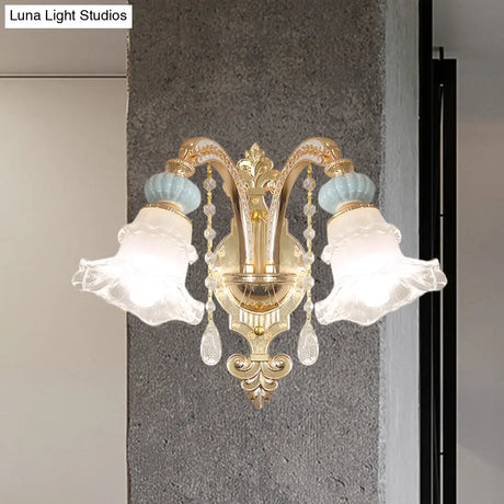 Traditional Blue Frosted Glass Wall Sconce With Ceramic Accent And Ruffle Trim