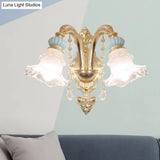 Traditional Blue Frosted Glass Wall Sconce With Ceramic Accent And Ruffle Trim