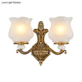 Traditional Brass Wall Sconce With Frosted Glass Shade Half Head Design